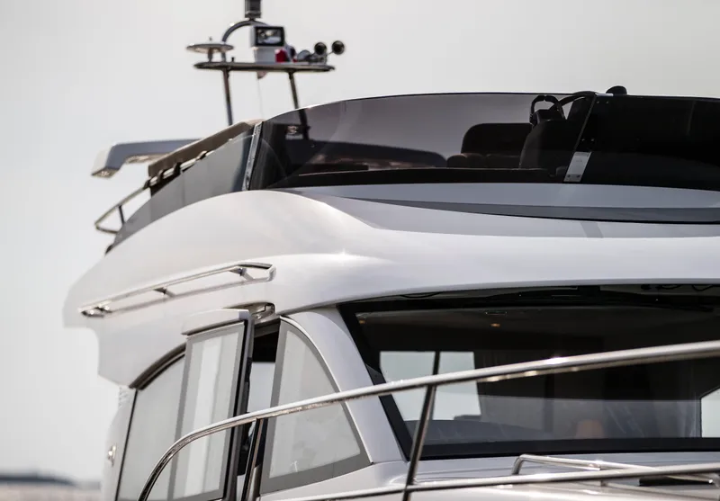 Slide: The Image of Nimbus 405 Flybridge 2025 yacht, sleek design, modern flybridge, luxury boating. - 2