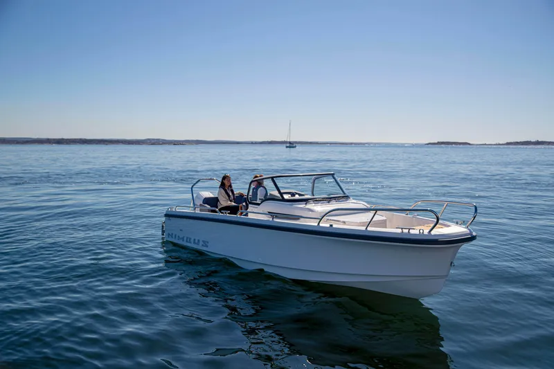 Slide: The Image of Nimbus Tender 8 boat cruising on calm waters, 2025 model. - 2