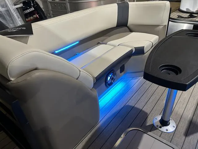 Slide: The Image of 2025 SunCatcher Select 322SS boat interior with LED lighting and Yamaha 250 "SHO" engine. - 15