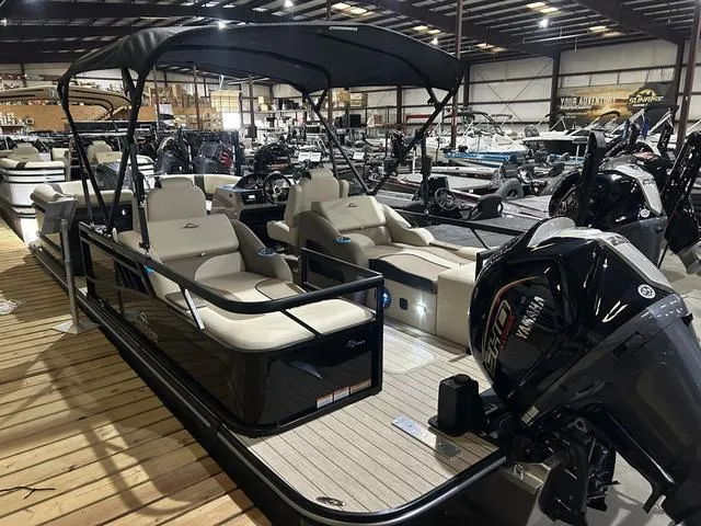Slide: The Image of 2025 SunCatcher Select 322SS pontoon boat with Yamaha 250 "SHO" engine in showroom. - 4