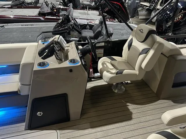 Slide: The Image of 2025 SunCatcher Select 322SS boat interior with Yamaha 250 "SHO" engine, featuring modern seating. - 8