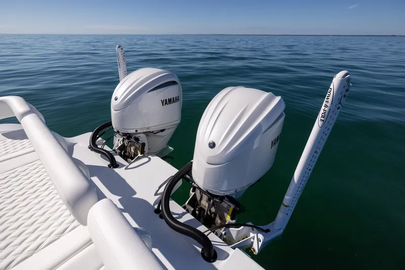 Slide: The Image of Freeman 28 boat with dual Yamaha outboard motors on calm sea, 2025 model. - 20