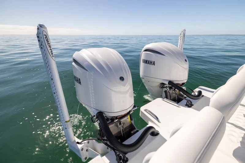 Slide: The Image of Freeman 28 boat with dual Yamaha outboard motors on open water, 2025 model. - 21