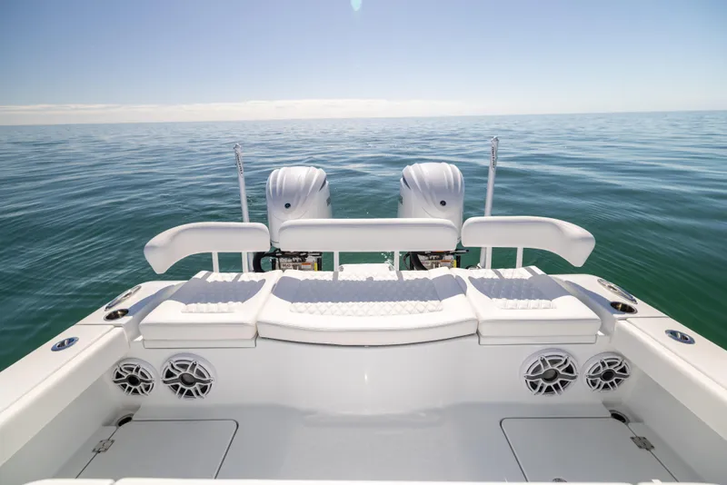 Slide: The Image of Freeman 28 boat, 2025 model, with dual engines on open sea. - 23