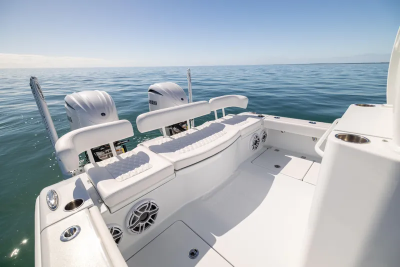 Slide: The Image of Freeman 28 boat, 2025 model, with dual engines on calm ocean waters. - 25