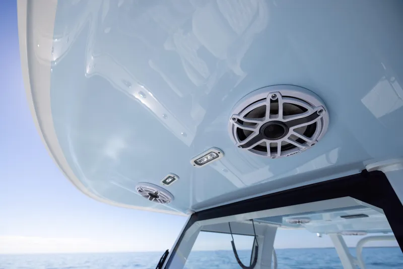 Slide: The Image of 2025 Freeman 28 boat speakers and lights on the ceiling, ocean view. - 49