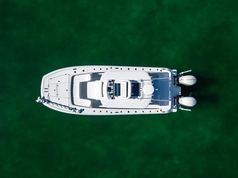 Slide: The Image of Aerial view of 2025 Freeman 28 boat on green water. - 6