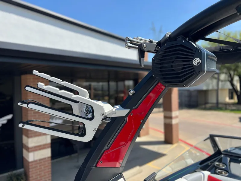 Slide: The Image of 2024 Tigé Z3 boat tower with wakeboard rack and speaker, close-up view. - 22