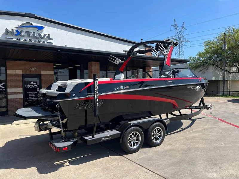 Slide: The Image of 2024 Tigé Z3 boat on trailer at NXT LVL Marine dealership. - 3