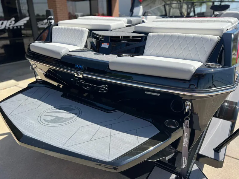 Slide: The Image of 2024 Tigé Z3 boat with sleek design and comfortable seating. - 6