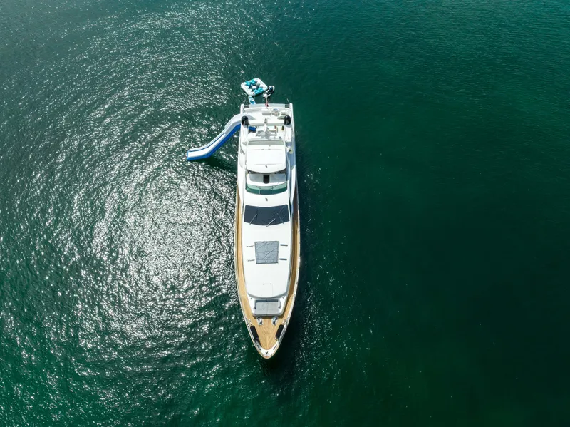 Slide: The Image of Aerial view of 2012 Azimut 116 yacht with slide on calm water. - 1