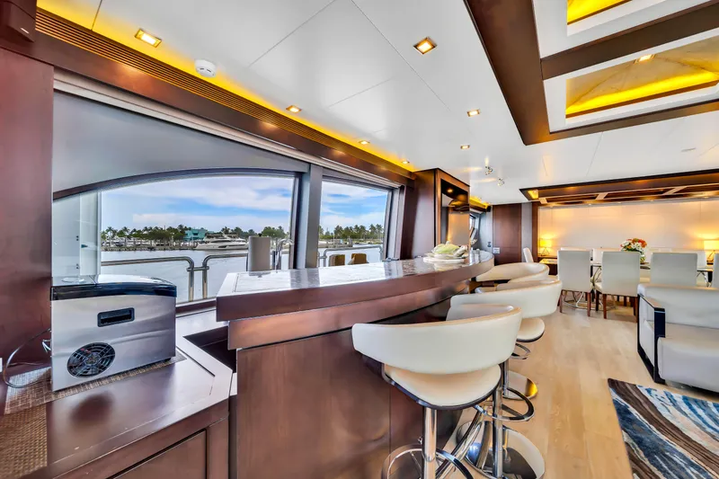 Slide: The Image of Luxurious interior of 2012 Azimut 116 yacht with modern bar and seating area. - 12
