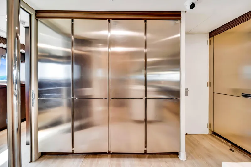 Slide: The Image of Luxurious stainless steel kitchen cabinets on a 2012 Azimut 116 yacht interior. - 27