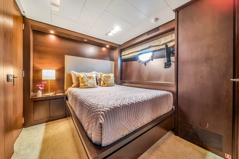 Slide: The Image of Luxurious bedroom interior of 2012 Azimut 116 yacht with elegant wood finishes. - 36