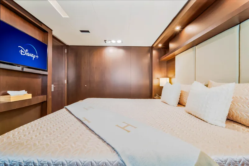 Slide: The Image of Luxurious bedroom on 2012 Azimut 116 yacht with TV and elegant bedding. - 43