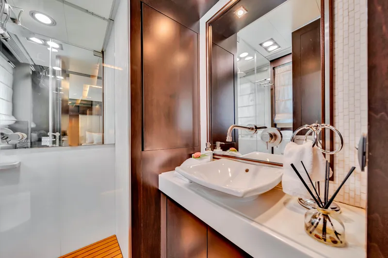 Slide: The Image of Luxurious bathroom interior on a 2012 Azimut 116 yacht, featuring modern sink and elegant decor. - 44