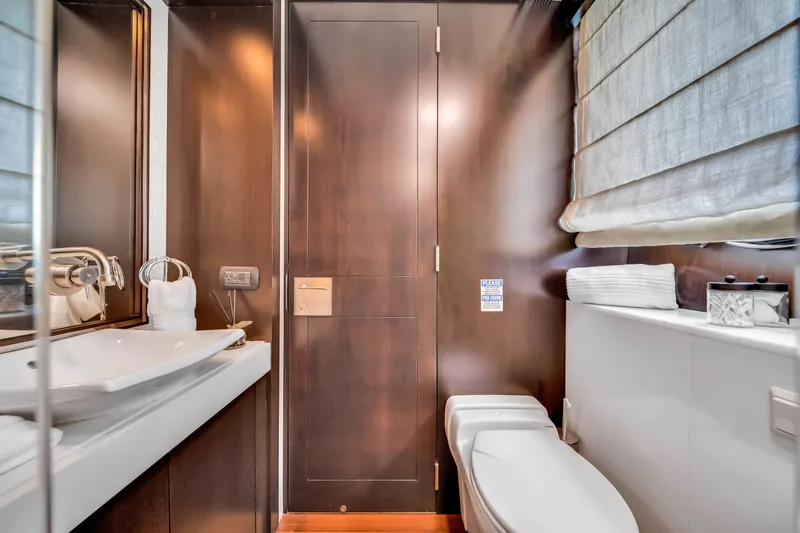 Slide: The Image of Luxurious bathroom interior on 2012 Azimut 116 yacht, featuring modern fixtures and elegant design. - 46