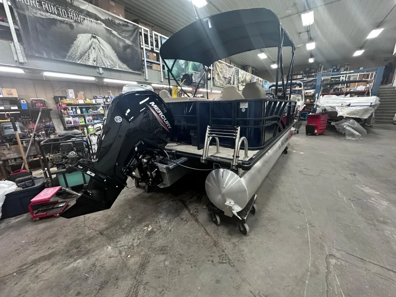 Slide: The Image of 2025 Sylvan Mirage Fish 820 Party Fish pontoon boat in a workshop setting. - 12