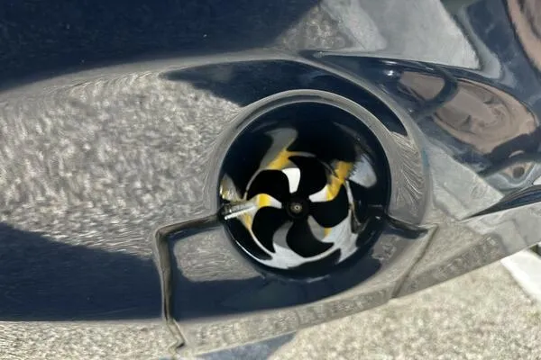 Slide: The Image of Close-up of a 2024 Jeanneau Leader 9.0 WA boat propeller. - 23