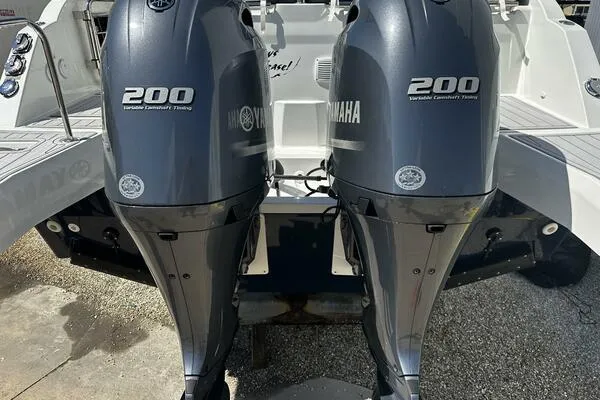 Slide: The Image of Twin Yamaha 200 engines on a 2024 Jeanneau Leader 9.0 WA boat. - 26