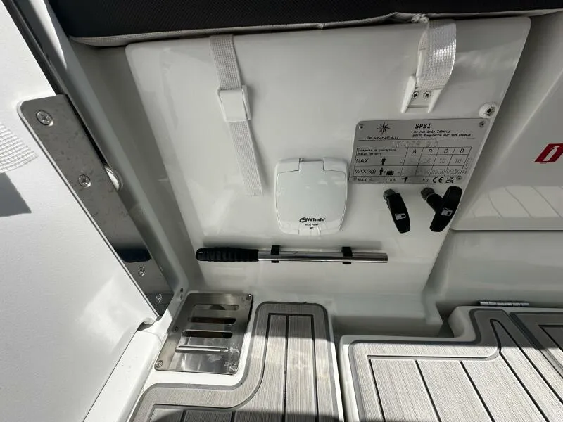Slide: The Image of 2024 Jeanneau Leader 9.0 WA boat interior, featuring control panel and deck details. - 34