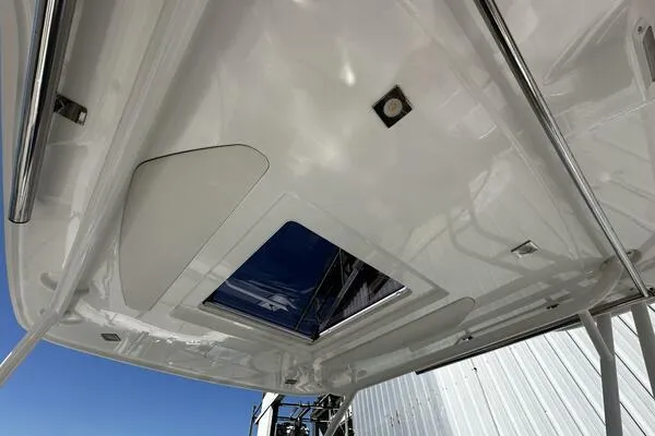 Slide: The Image of 2024 Jeanneau Leader 9.0 WA boat roof with hatch and stainless steel fittings. - 49