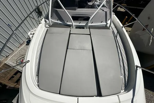 Slide: The Image of 2024 Jeanneau Leader 9.0 WA boat with spacious sunbathing deck and sleek design. - 7