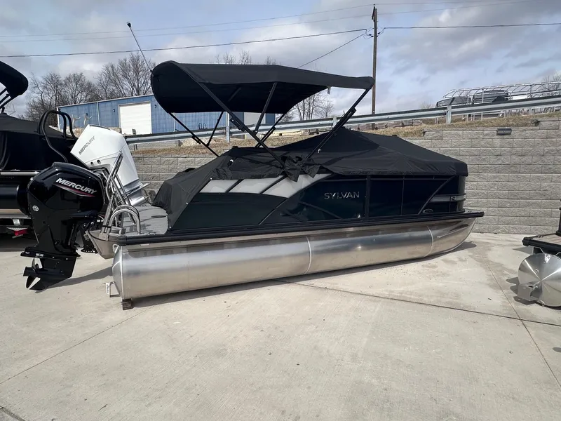 The Image of 2025 Sylvan Mirage Cruise 8520 CLZ DH pontoon boat with black canopy and Mercury outboard. - 0