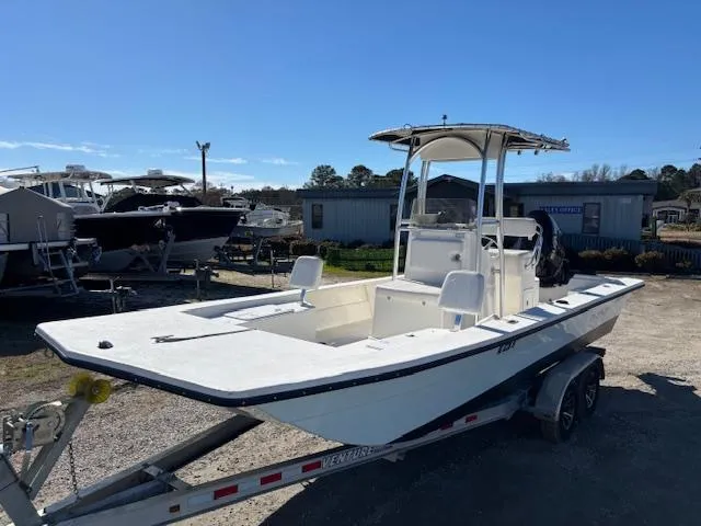 Slide: The Image of 2022 May-Craft 22 Hancock Skiff on trailer, parked outdoors under clear sky. - 11