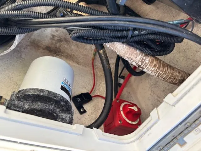 Slide: The Image of 2022 May-Craft 22 Hancock Skiff interior wiring and components view. - 18