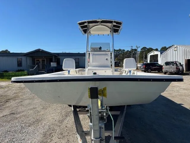 Slide: The Image of 2022 May-Craft 22 Hancock Skiff on trailer, parked outdoors under clear blue sky. - 2