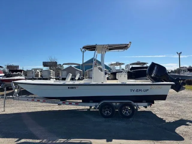 Slide: The Image of 2022 May-Craft 22 Hancock Skiff on trailer, side view, sunny day. - 4