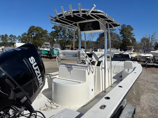 Slide: The Image of 2022 May-Craft 22 Hancock Skiff with Suzuki engine, parked outdoors. - 9