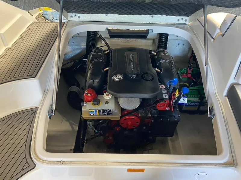 Slide: The Image of 2019 Chaparral 257 SSX boat engine compartment with Volvo Penta engine. - 32