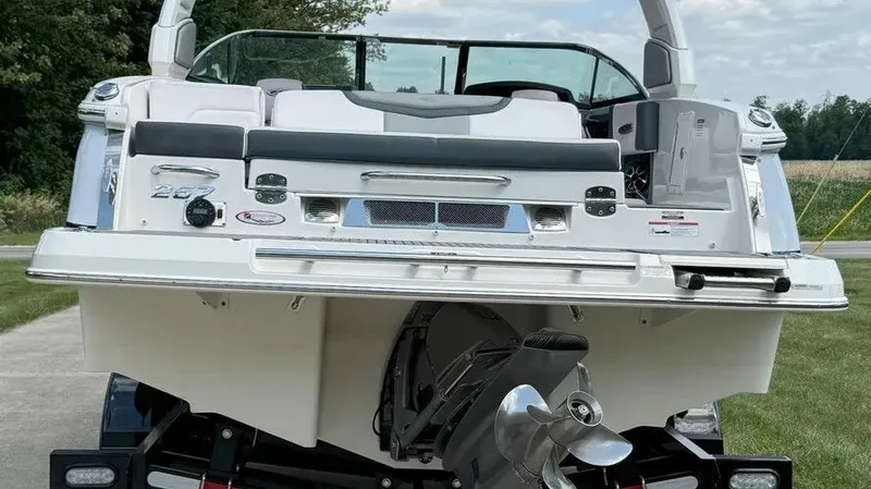 Slide: The Image of 2019 Chaparral 257 SSX boat, rear view with propeller and seating area. - 4