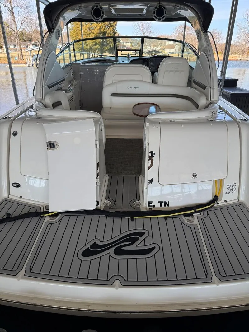 Slide: The Image of 2007 Sea Ray 38 Sundancer boat with open cockpit and seating area. - 16