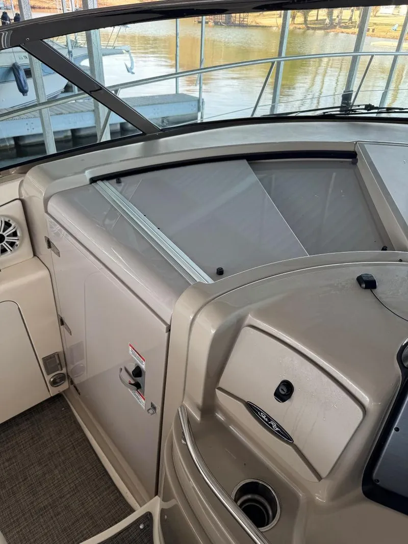 Slide: The Image of 2007 Sea Ray 38 Sundancer cockpit with sleek design and modern amenities. - 33