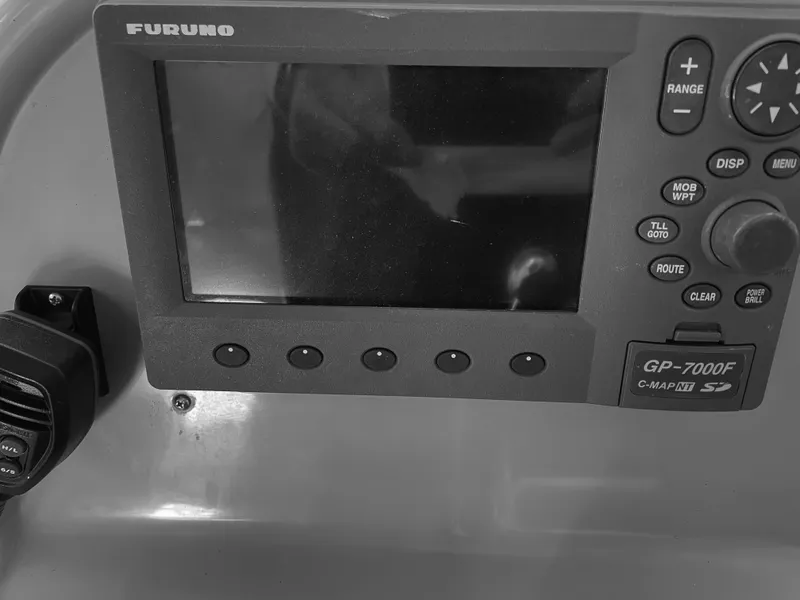 Slide: The Image of Furuno GP-7000F navigation system on 2000 Sea Ray 290 Amberjack boat dashboard. - 14