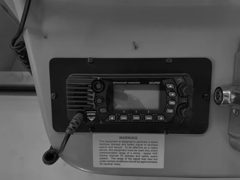 Slide: The Image of Standard Horizon Eclipse radio on 2000 Sea Ray 290 Amberjack boat dashboard. - 15