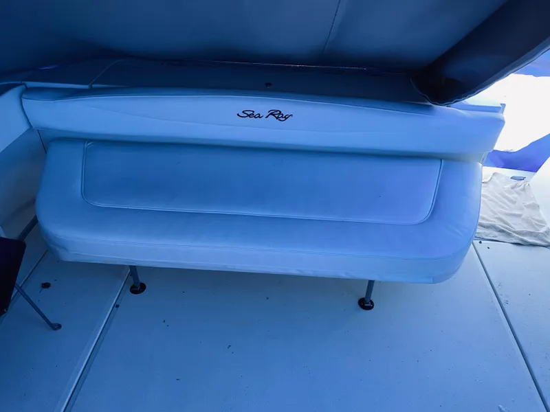 Slide: The Image of 2000 Sea Ray 290 Amberjack boat interior seating area. - 18