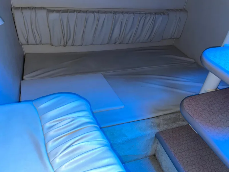 Slide: The Image of Interior cabin of 2000 Sea Ray 290 Amberjack with blue lighting. - 21