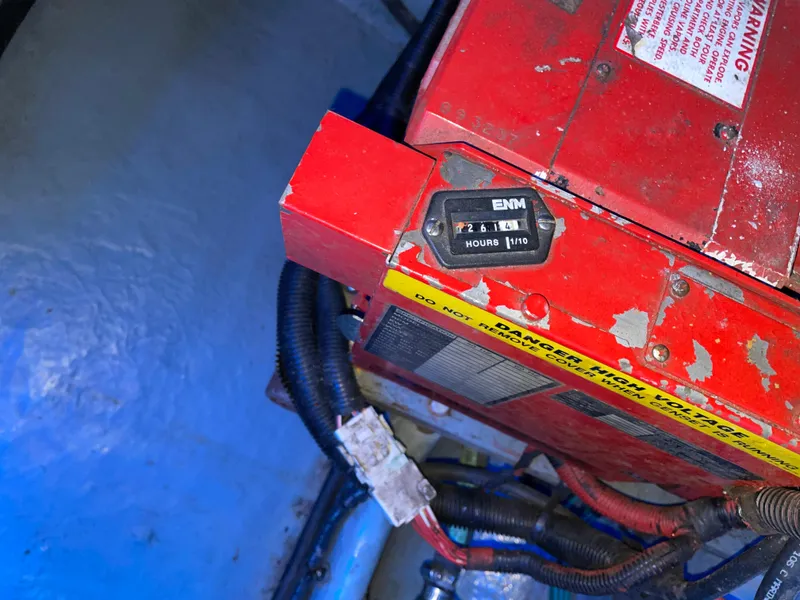 Slide: The Image of Engine compartment of 2000 Sea Ray 290 Amberjack with hour meter display. - 9