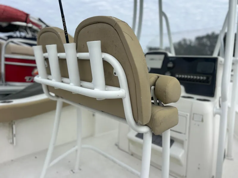 Slide: The Image of 2016 Tidewater 210 LXF boat interior with rod holders and seating. - 14