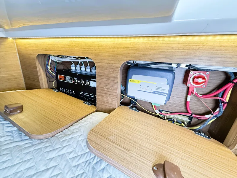 Slide: The Image of Electrical panel and wiring inside a 2021 Jeanneau NC 895 boat cabin. - 37