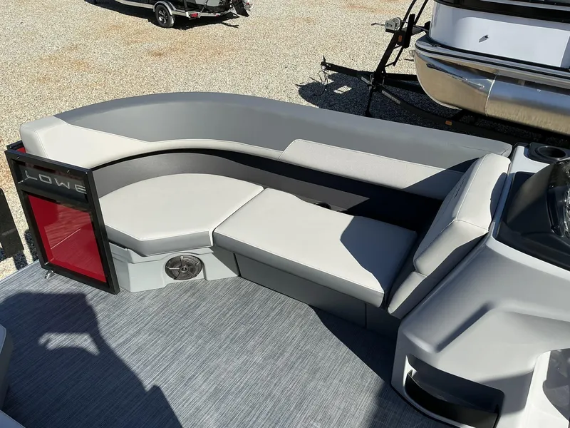 Slide: The Image of 2025 Lowe LS 170 boat interior with gray seating and modern design. - 3