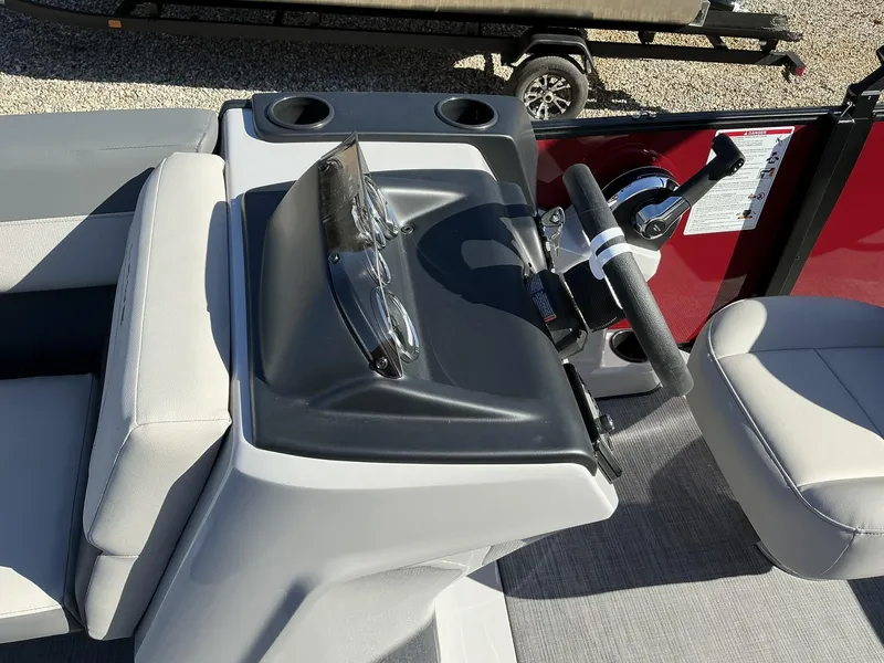 Slide: The Image of Lowe LS 170 boat console, 2025 model, featuring steering wheel and seating. - 9