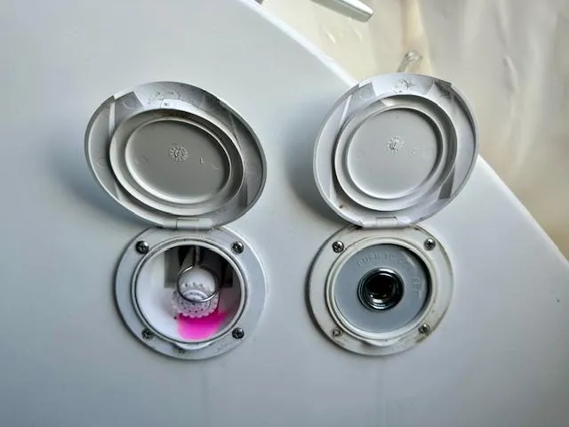 Slide: The Image of Boat fuel and water fill ports on a 2019 Beneteau Antares 27. - 31