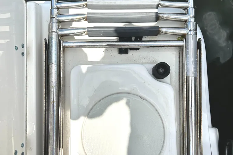 Slide: The Image of Stainless steel ladder on 2017 Boston Whaler 320 Vantage boat deck. - 43