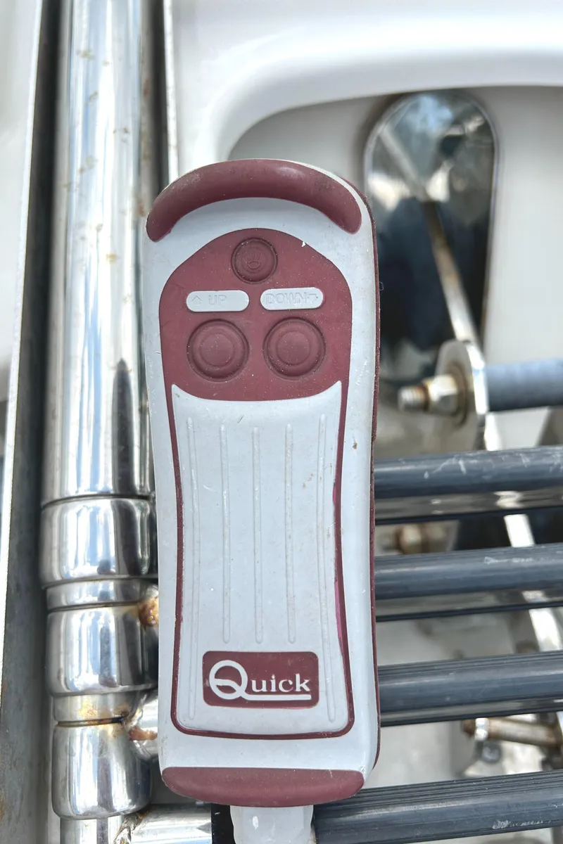 Slide: The Image of Close-up of a Quick control panel on a 2017 Boston Whaler 320 Vantage boat. - 45