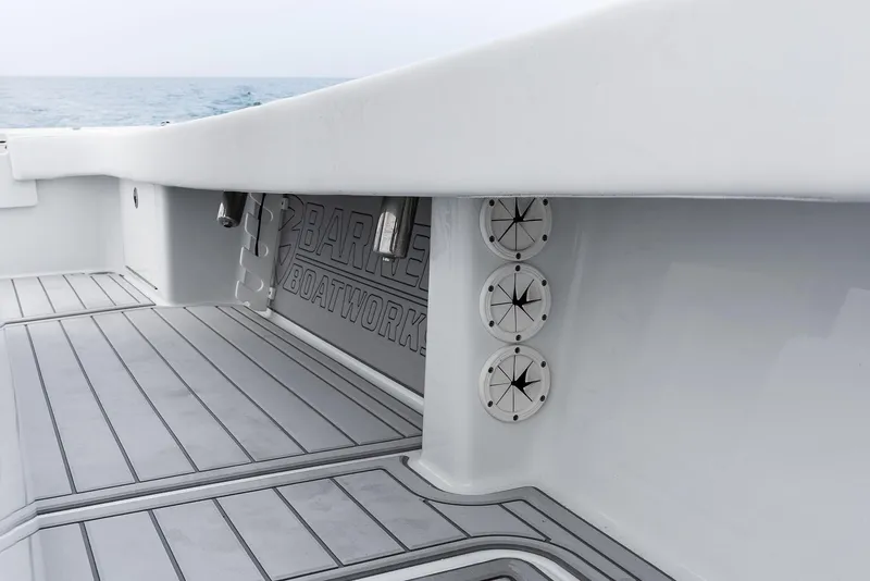 Slide: The Image of 2022 Barker Boatworks 26 Open deck, showcasing sleek design and craftsmanship. - 18